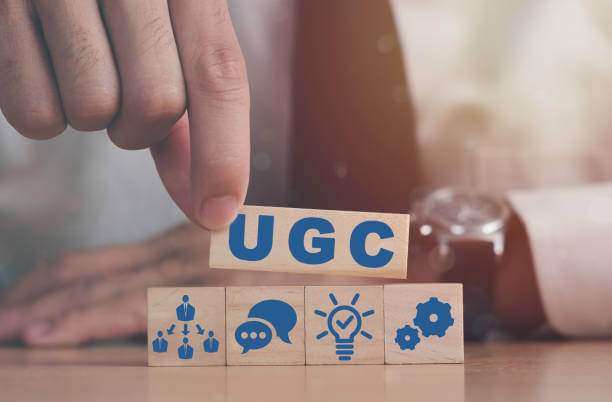 UGC is written in blue font on the blocks